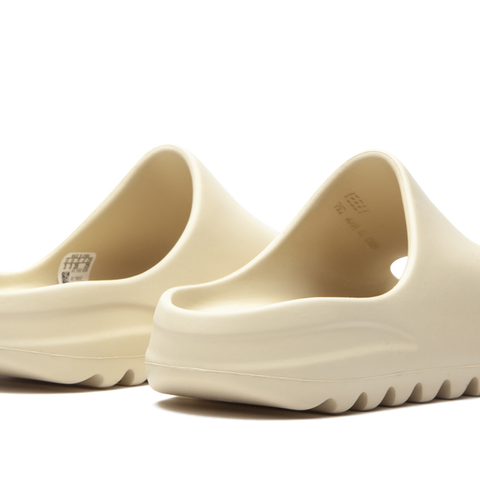 YEEZY Yeezy Slide Kids "Bone" Stadium Goods YEEZY Yeezy Slide Kids "Bone" Stadium Goods