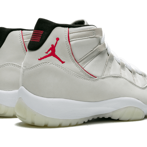 Jordan 11 platinum tint retail price shop
