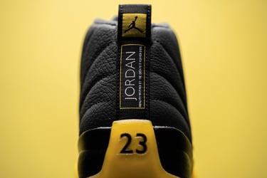 black and yellow jordan shoes